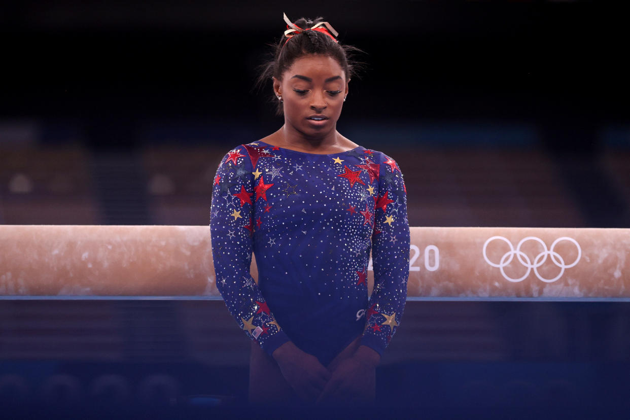 TOKYO, JAPAN - JULY 25: Simone Biles of Team United States looks on during Women's Qualification on day two of the Tokyo 2020 Olympic Games at Ariake Gymnastics Centre on July 25, 2021 in Tokyo, Japan. (Photo by Ezra Shaw/Getty Images)