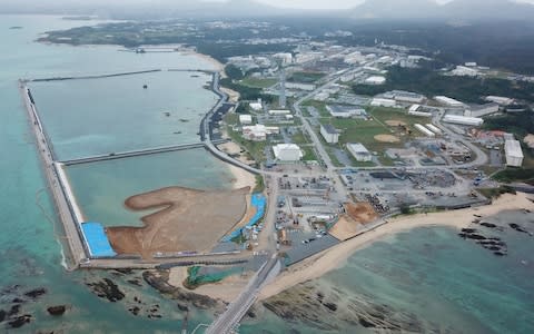 Photo taken from a drone shows the relocation site for U.S. Marine Corps Air Station Futenma in the Henoko coastal district of Nago, Okinawa  - Credit: Splash News&nbsp;