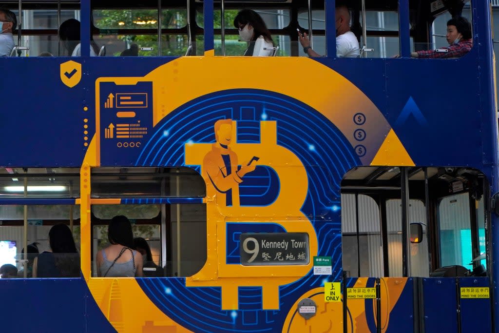 Bitcoin Goes Mainstream (Copyright 2021 The Associated Press. All rights reserved)