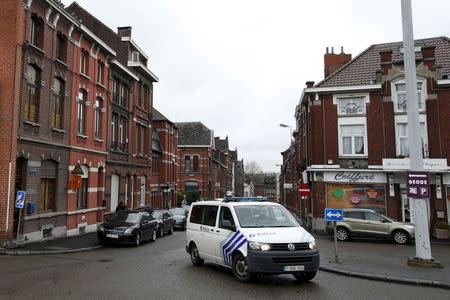 A Belgian police van is pictured in a street called "Rue du Fort" in Charleroi, Belgium, January 13, 2016. REUTERS/Francois Lenoir