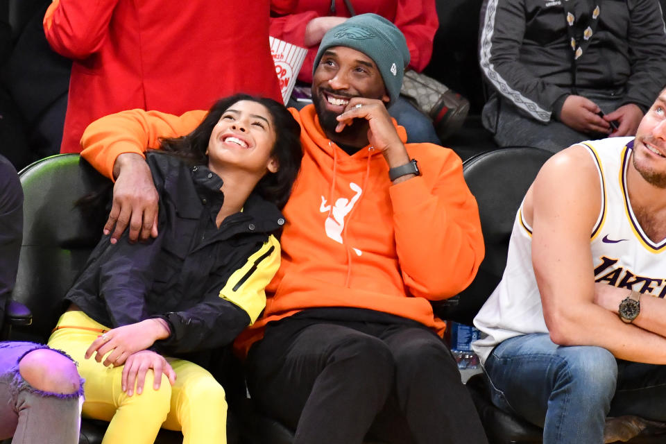 Kobe Bryant and daughter Gianna Bryant attend a basketball game between the Los Angeles Lakers and the Dallas Mavericks at Staples Center on December 29, 2019 in Los Angeles, California. (Photo by Allen Berezovsky/Getty Images)