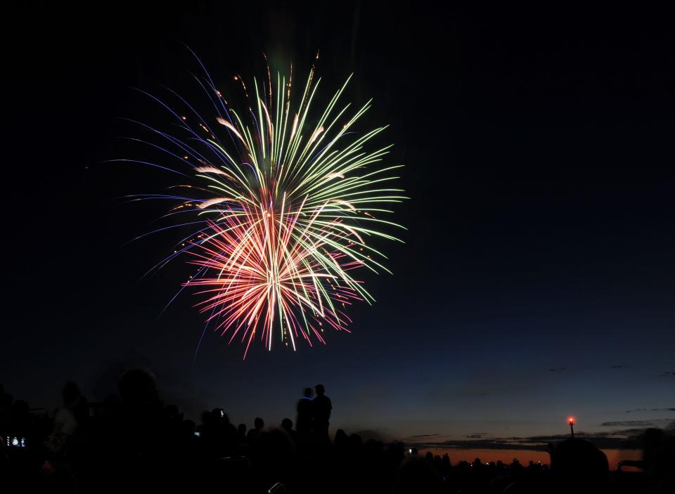 Red, white and blue fireworks exploded over Rock Harbor in 2016.