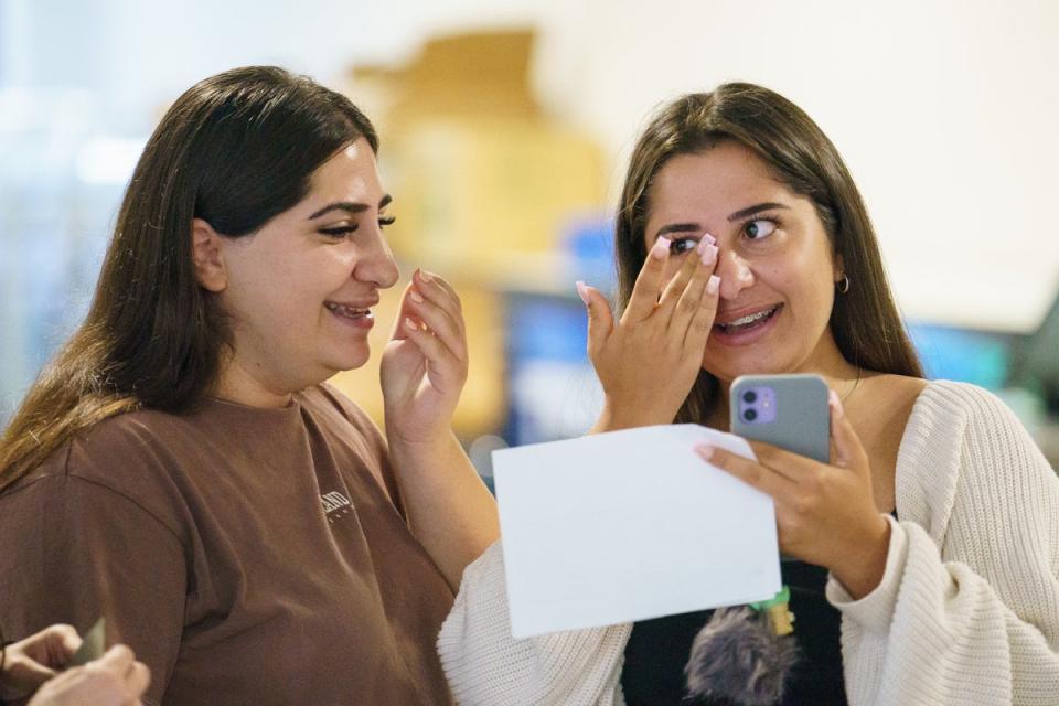 Naz Capar (right) and her sister Sara wiped away tears ((Dominic Lipinski/PA) (PA Wire)