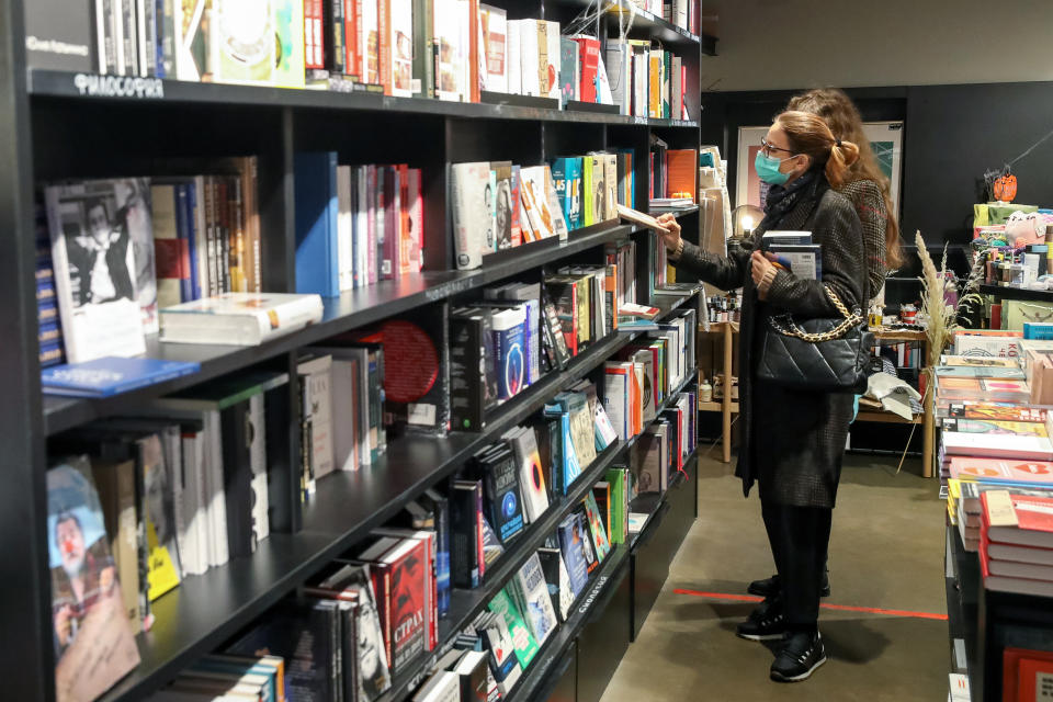 MOSCOW, RUSSIA - OCTOBER 29, 2020: People shop at a Respublica bookstore. The Respublica bookstore chain was founded by Dymov Group owner Vadim Dymov in 2006. The chain has decided to file for bankruptcy, as it is unable to fulfill its obligations to creditors due to decline in traffic and shortfall amid the COVID-19 pandemic. Vyacheslav Prokofyev/TASS (Photo by Vyacheslav Prokofyev\TASS via Getty Images)