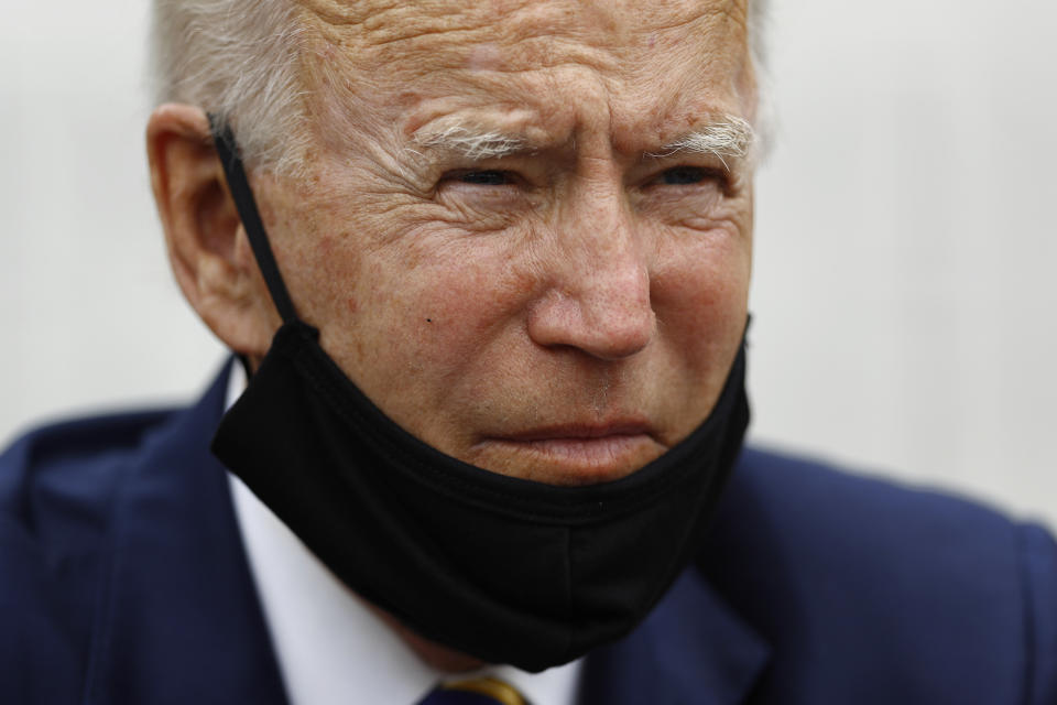 Democratic presidential candidate, former Vice President Joe Biden listens as he meets with small business owners, Wednesday, June 17, 2020, at Carlette's Hideaway, a soul food restaurant, in Yeadon, Pa. (AP Photo/Matt Slocum)