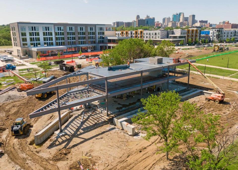 Development continues at Berkley Riverfront Park this month, where the Origin Hotel Kansas City, left, will open this summer, as will Two Birds, One Stone, a publicly owned beer garden under construction.
