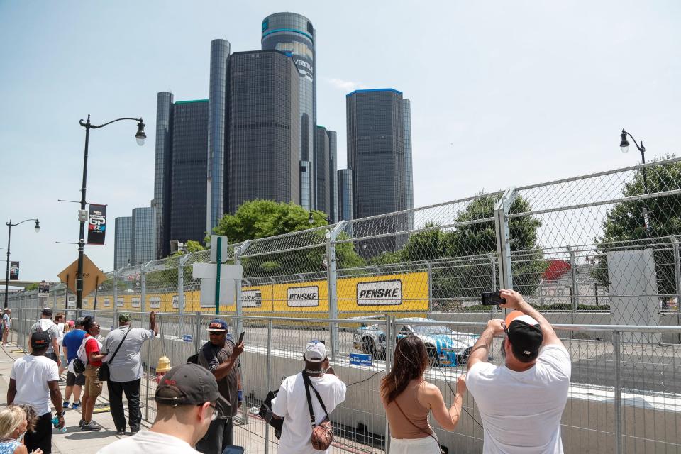 Race car fans watch Trans Am cars practice during the Free Prix Day of Detroit Grand Prix in Detroit on Friday, June 2, 2023.