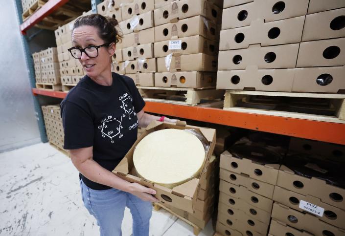 Katie Schall talks about the aging process of cheese at Beehive Cheese, a second generation family-owned business, in Uintah, Weber County, on Tuesday, May 2, 2023. | Jeffrey D. Allred, Deseret News