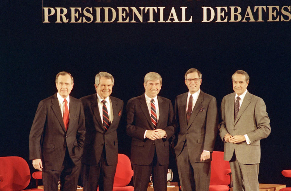 FILE - In this Sunday, Feb. 14, 1988, file photo, Republican presidential candidates, Vice President George Bush, from left, Pat Robertson, Rep. Jack Kemp, Pierre "Pete" du Pont and Senator Bob Dole pose before starting their last debate before the primary in Goffstown, N.H. Current and former Delaware politicians, family and friends of Pierre S. “Pete” du Pont IV remembered the late governor, U.S. House member and presidential candidate, for reviving the state’s economy, working across the partisan aisle and sharing a cheerful spirit. A memorial service, Friday, April 29, 2022 at a Wilmington theater came nearly a year after du Pont died in May 2021 at age 86 after a long illness. (AP Photo/Jim Cole, File)