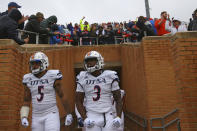 UTSA players enter the field before the first half of an NCAA college football game against North Texas in Denton, Texas, Saturday, Nov. 27, 2021. (AP Photo/Andy Jacobsohn)