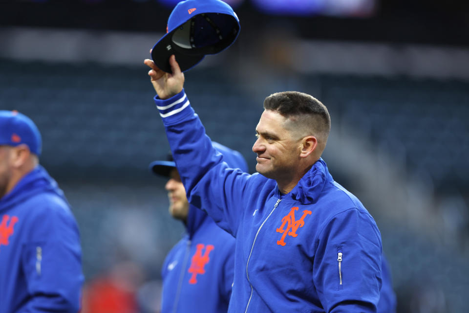 New York Mets manager Carlos Mendoza acknowledges fans after the team's 2-1 win over the Detroit Tigers in the second game of a baseball doubleheader Thursday, April 4, 2024, in New York. (AP Photo/Noah K. Murray)