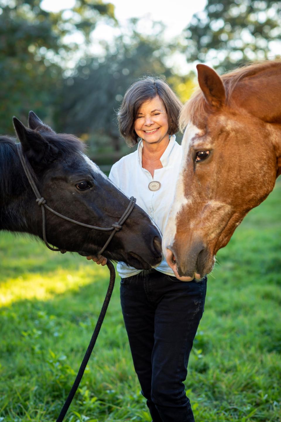 Author Geraldine Brooks with a couple of equine friends.