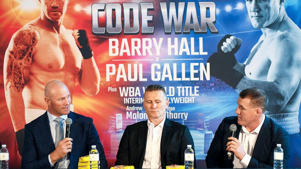 Fight promoter Danny Green sits between Barry Hall and Paul Gallen. 