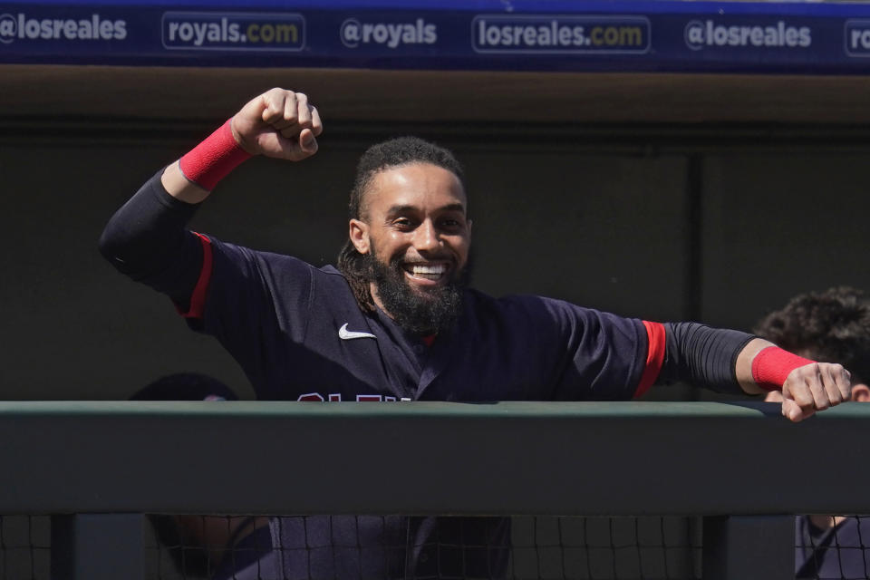 Cleveland Indians' Billy Hamilton gestures to the Texas Rangers' dugout before a spring training baseball game Tuesday, March 9, 2021, in Surprise, Ariz. (AP Photo/Sue Ogrocki)