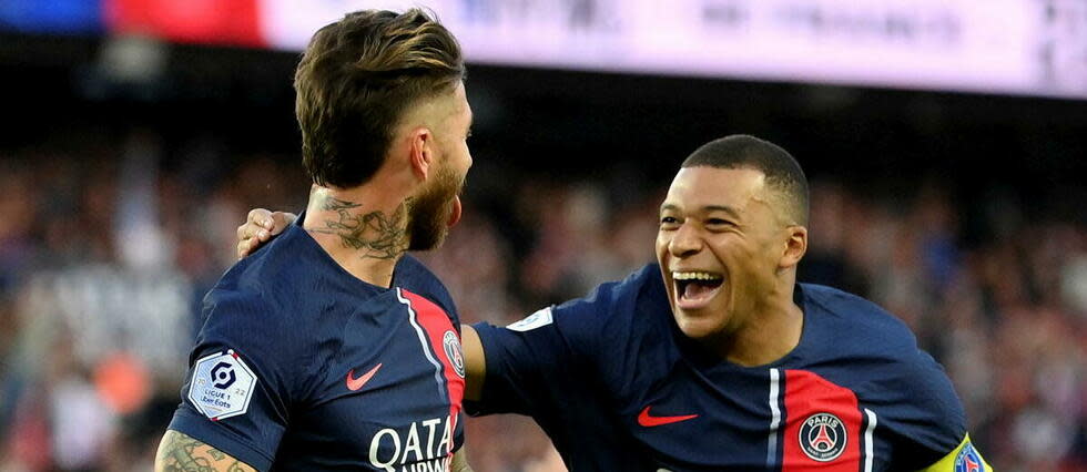 Kylian Mbappé (ici avec Sergio Ramos) termine meilleut buteur de Ligue 1 avec 29 buts en 34 matchs.  - Credit:Franck Fife/AFP