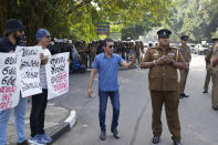 Sri Lankan social media activists hold placards with slogans against the proposed Online Safety Bill during a protest near the Parliament in Colombo, Sri Lanka, Tuesday, Jan. 23, 2024. (AP Photo/Eranga Jayawardena)