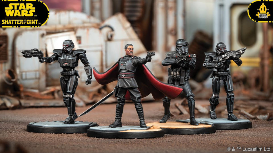 Models of Dark Troopers, a Death Trooper, and Moff Gideon on a Star Wars: Shatterpoint battlefield