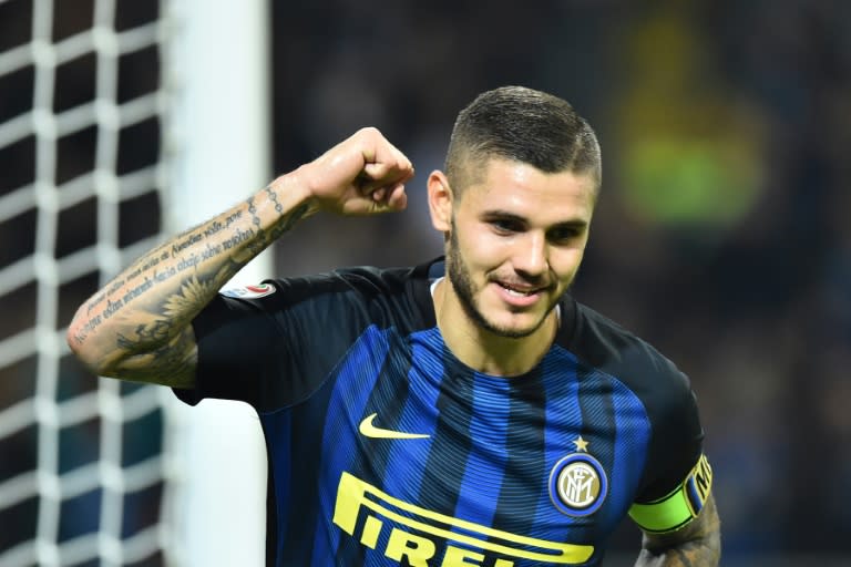 Inter Milan's forward from Argentina Mauro Icardi celebrates after scoring against Torino at "San Siro" Stadium in Milan on October 26, 2016