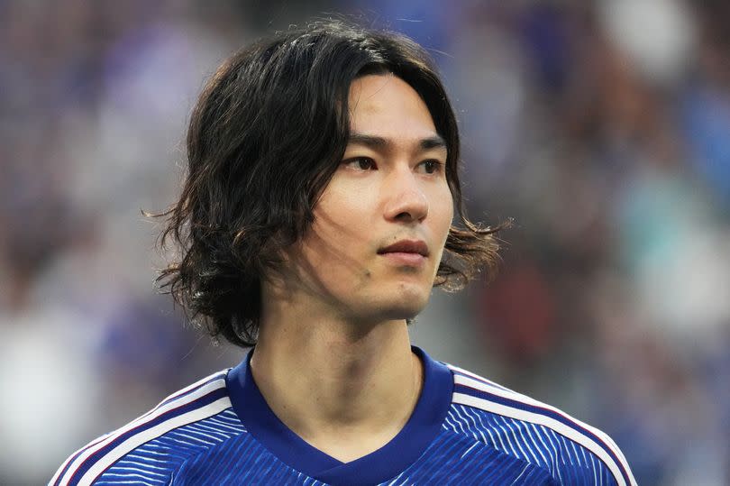 Takumi Minamino of Japan looks on prior to the FIFA World Cup Asian second qualifier Group B match between Japan and Syria at Hiroshima Peace Wing on June 11, 2024 in Hiroshima, Japan.