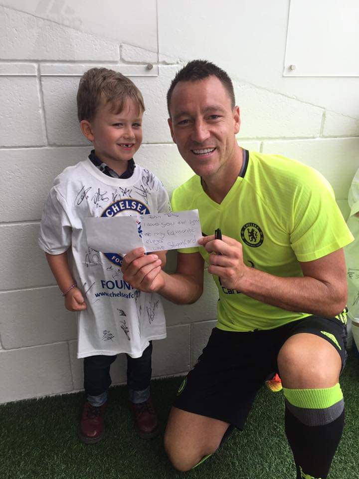 Stamford pictured here meeting his favourite football player, John Terry. (Collect/PA Real Life)