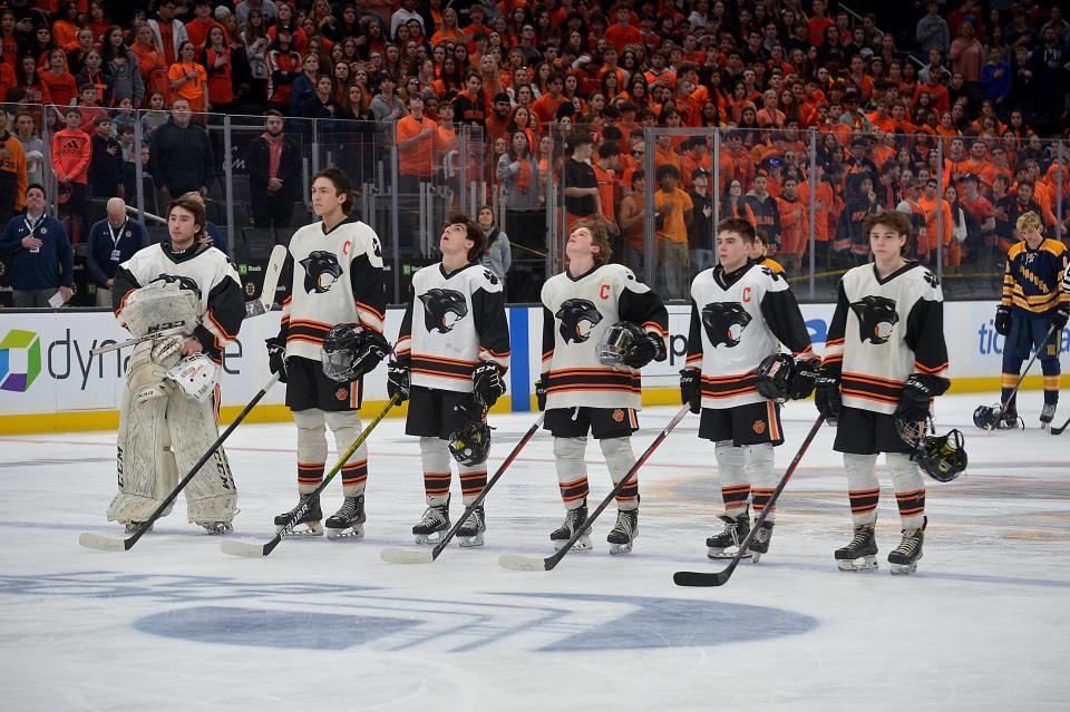 Marlborough High School starters line up for the national anthem in the 2022 Division 3 state championship hockey game against Hanover at TD Garden2. From left: Daniel Esteves, captain Collin Tunnera, John Fantasia, Marcus Chrisafideis, Mark Evangelous and Noah Lind.