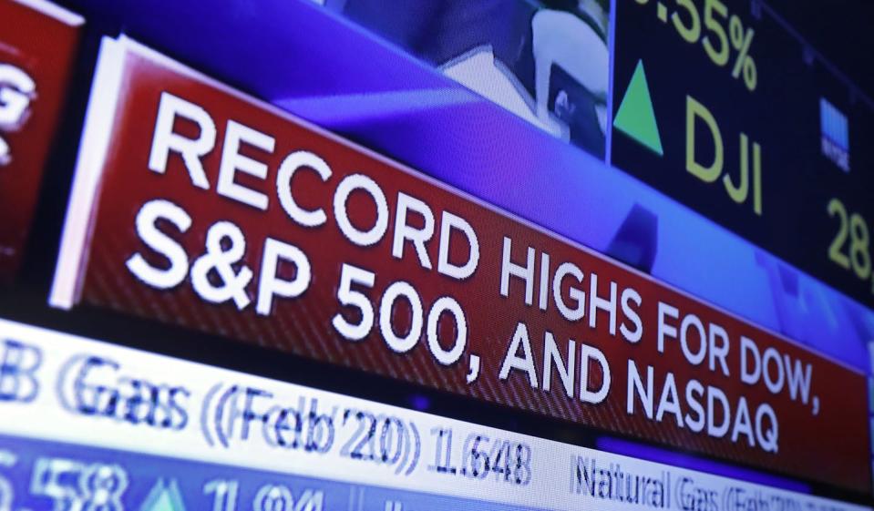 Major stock indexes were hitting or nearing records in February 2024, as they were in early 2020 when this TV chyron appeared. <a href="https://newsroom.ap.org/detail/FinancialMarketsWallStreet/1d60b3c58f8149a6bf9f1c9b48dfb189/photo?Query=S&P%20500=&mediaType=photo&sortBy=&dateRange=Anytime&totalCount=9&digitizationType=Digitized&currentItemNo=1&vs=true" rel="nofollow noopener" target="_blank" data-ylk="slk:AP Photo/Richard Drew;elm:context_link;itc:0;sec:content-canvas" class="link ">AP Photo/Richard Drew</a>