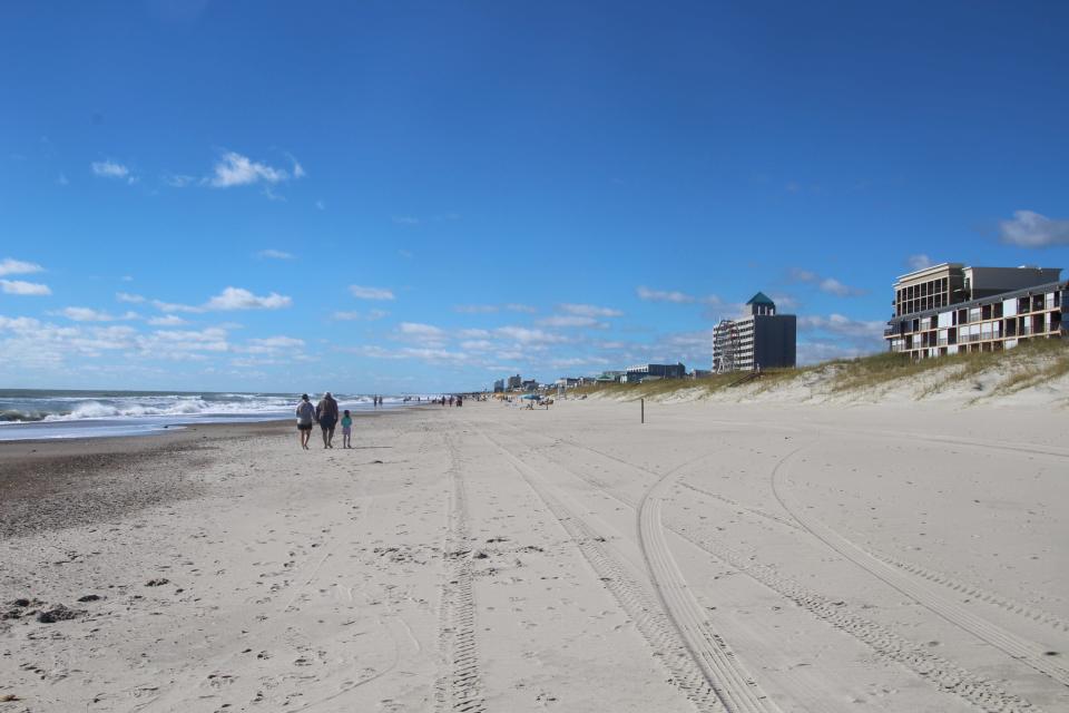The impacts of Hurricane Ian were barely noticeable Saturday morning at Carolina Beach as residents and visitors were already enjoying a sunny day.