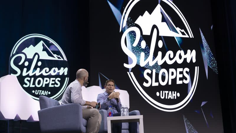 John Bowers, left, director of partnerships at Silicon Slopes, interviews Steve Young, former BYU and NFL quarterback, during the Silicon Slopes Summit at Vivint Arena in Salt Lake City on Friday, Sept. 30, 2022. WalletHub released the ranking of states that are the most innovative in the U.S.