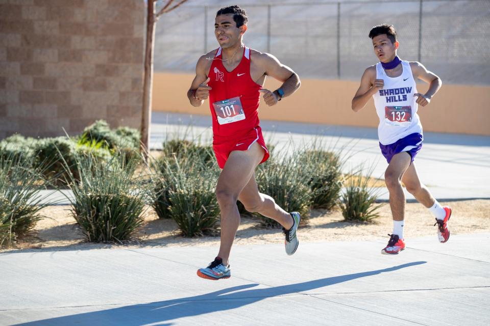 Indio and Shadow Hills High School cross country runners compete at Indio High School in Indio, Calif., on Friday, February 12, 2021. The meet on Friday marked the first high school sporting event in 11 months due to the COVID-19 pandemic. 