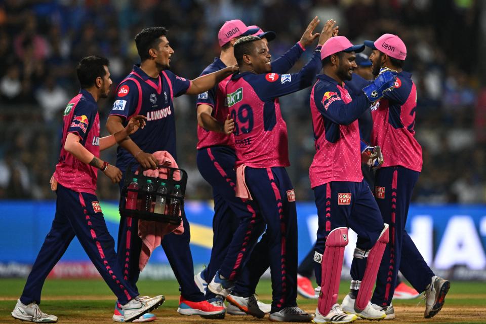 Rajasthan Royals' Shimron Hetmyer celebrates with teammates after taking a catch to dismiss Mumbai Indians' Piyush Chawla during the IPL match between Mumbai Indians and Rajasthan Royals at the Wankhede Stadium in Mumbai on April 1, 2024.