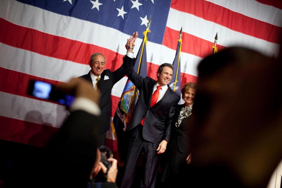 New York Governor-elect Andrew Cuomo (C) celebrates with his father former New York Governor Mario Cuomo (L) and mother Matilda Cuomo at the Sheraton New York on election night, November 2, 2010 in New York City.