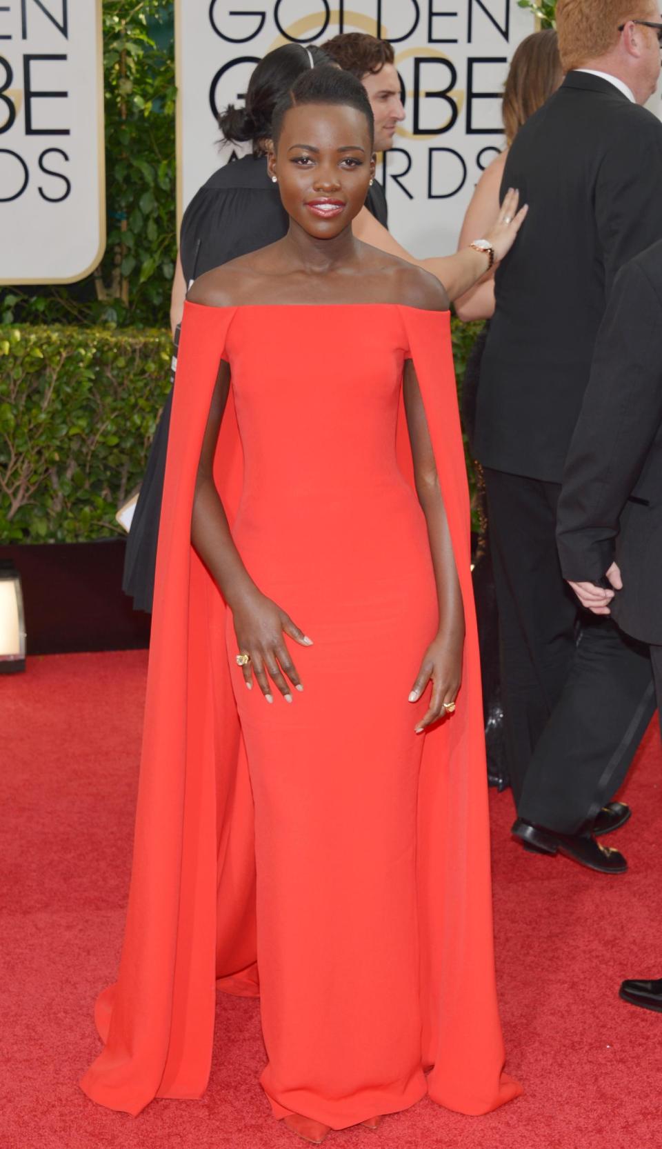 Lupita Nyong'o arrives at the 71st annual Golden Globe Awards at the Beverly Hilton Hotel on Sunday, Jan. 12, 2014, in Beverly Hills, Calif. (Photo by John Shearer/Invision/AP)