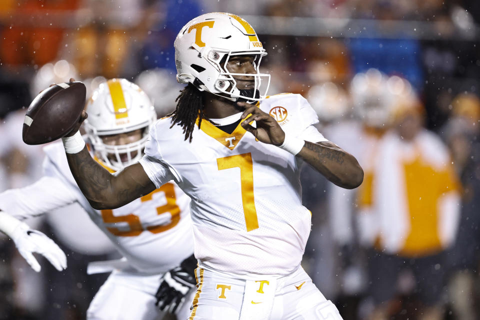 Tennessee quarterback Joe Milton III (7) throws to a receiver during the first half of the team's NCAA college football game against Vanderbilt, Saturday, Nov. 26, 2022, in Nashville, Tenn. (AP Photo/Wade Payne)