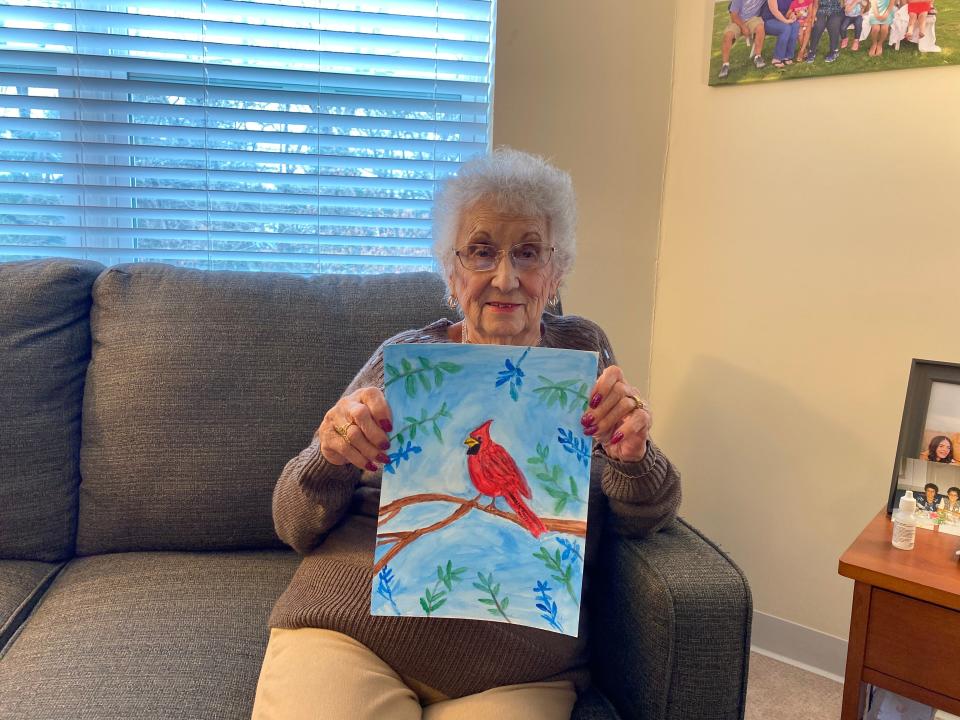 On March 27, 2024, Alice Perry, a lifelong Taunton resident, who will turn 100 on April 8, 2024, shows off some of the paintings she's made since coming to senior living at The Residence at Great Woods in Norton, where she moved only last year.