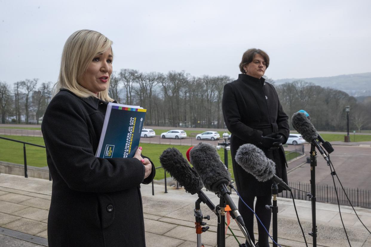 <p>Michelle O’Neill and Arlene Foster defended the plan, saying they want to take a ‘cautious’ approach to lifting restrictions</p> (PA)