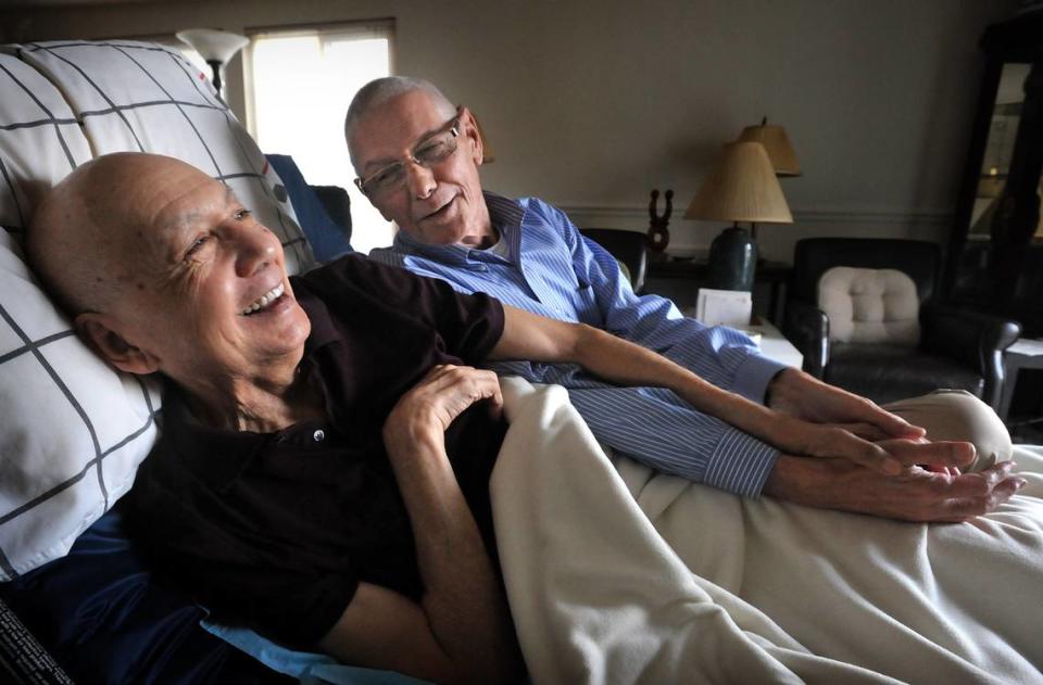 Rudy Henry, left, and John McCluskey in their Tacoma home on Nov. 8, 2012. ( Lui Kit Wong/Staff Photographer)