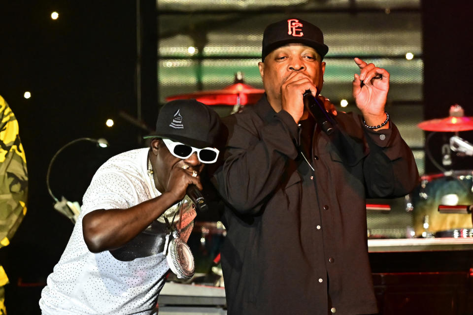 US rappers Flavor Flav (L) and Chuck D from Public Enemy perform onstage during the Recording Academy and Clive Davis' Salute To Industry Icons pre-Grammy gala at the Beverly Hilton hotel in Beverly Hills, California on February 3, 2024. (Photo by Frederic J. Brown / AFP)