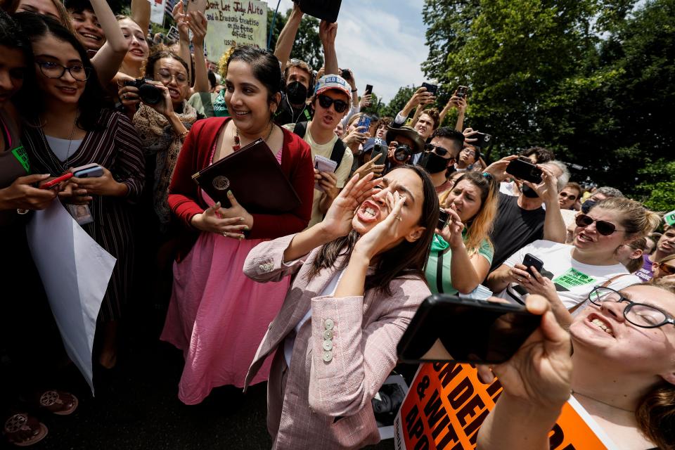 Democratic Rep. Alexandria Ocasio-Cortez speaks to abortion rights supporters in Washington after the Supreme Court's decision Friday.