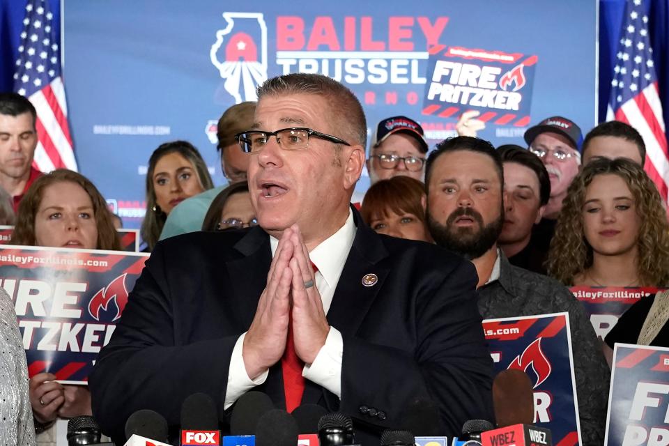 Republican gubernatorial candidate Darren Bailey responds to reporters questions after winning the Republican gubernatorial primary on June 28, 2022, in Effingham, Ill. Bailey will now face Democratic Gov. J.B. Pritzker in the fall.