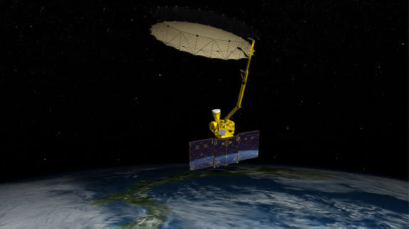 Artist's concept of NASA's Soil Moisture Active Passive (SMAP) spacecraft in orbit.