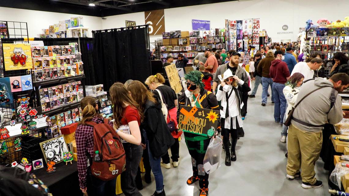 Patrons, including some dressed up in cosplay, wander the exhibit floor during the 2022 Lexington Comic and Toy Convention at the Central Bank Center in Lexington, Ky. on Sunday, March 27, 2022. Vendors were selling rare toys and collectibles, comics, art work and pop culture goods from their booths.