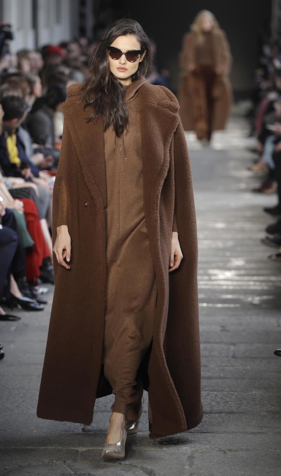 A model wears a creation part of Max Mara's women's Fall/Winter 2017-2018 collection, presented during the Milan Fashion Week, in Milan, Italy, Thursday, Feb. 23, 2017. (AP Photo/Luca Bruno)