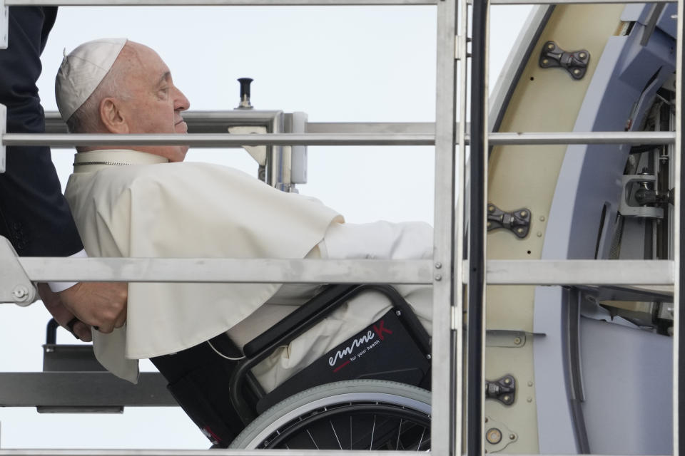 Pope Francis boards his flight at Rome's Leonardo da Vinci International airport in Fiumicino to start his five-day pastoral visit to Portugal Wednesday, Aug. 2, 2023, that includes the participation into the 37th World Youth Day, and a pilgrimage to the holy shrine of Fatima. (AP Photo/Andrew Medichini)
