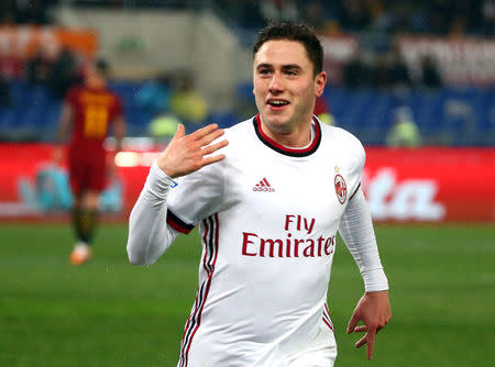 Soccer Football - Serie A - AS Roma vs AC Milan - Stadio Olimpico, Rome, Italy - February 25, 2018 AC Milan's Davide Calabria celebrates scoring their second goal REUTERS/Alessandro Bianchi