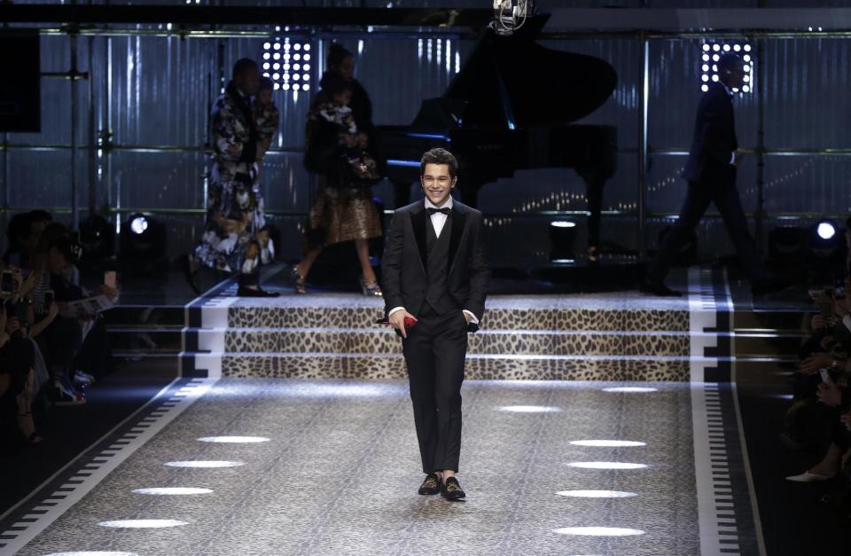 Singer Austin Mahone walks down the catwalk of the Dolce&Gabbana women's Fall-Winter 2017-2018 collection, part of the Milan Fashion Week, unveiled in Milan, Italy, Sunday, Feb. 26, 2017. (AP Photo/Luca bruno)