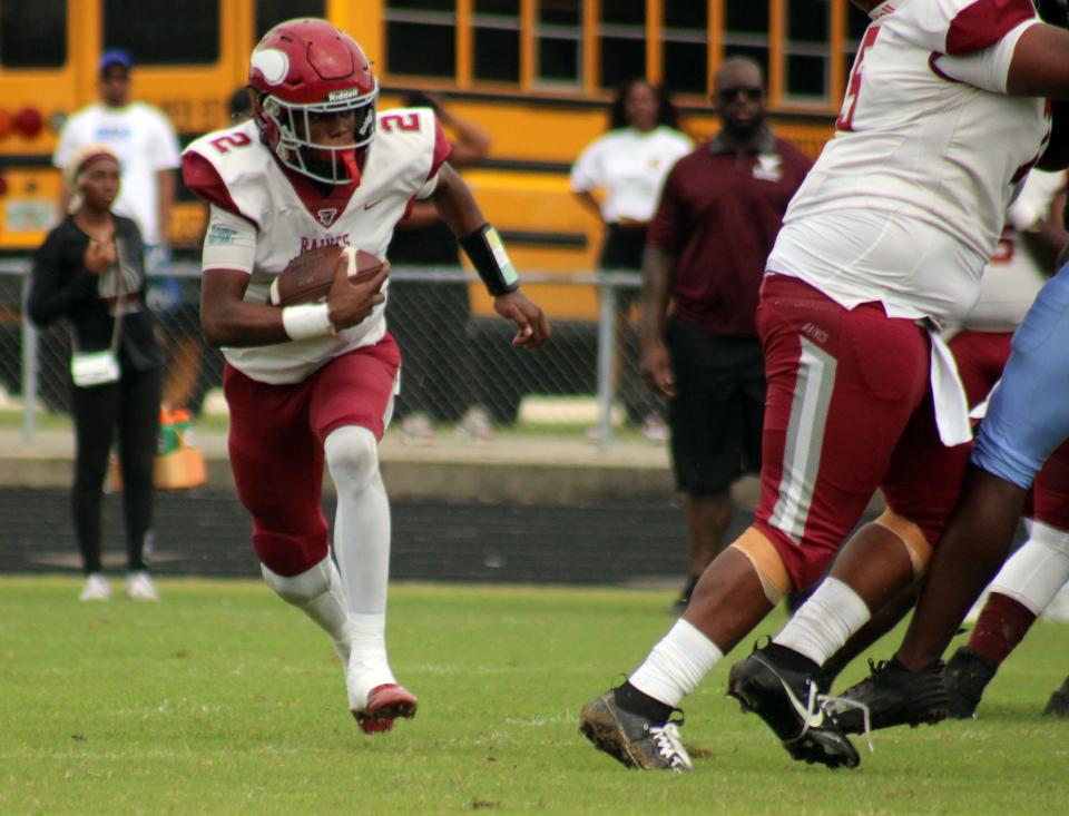 Raines quarterback Ty'ren Randolph (2) scrambles for yardage during the Northwest Classic high school football game against Ribault on October 14, 2023. [Clayton Freeman/Florida Times-Union]