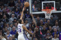 Sacramento Kings forward Keegan Murray (13) is guarded by Toronto Raptors forward Pascal Siakam during the first quarter of an NBA basketball game in Sacramento, Calif., Wednesday, Jan. 25, 2023. (AP Photo/Randall Benton)