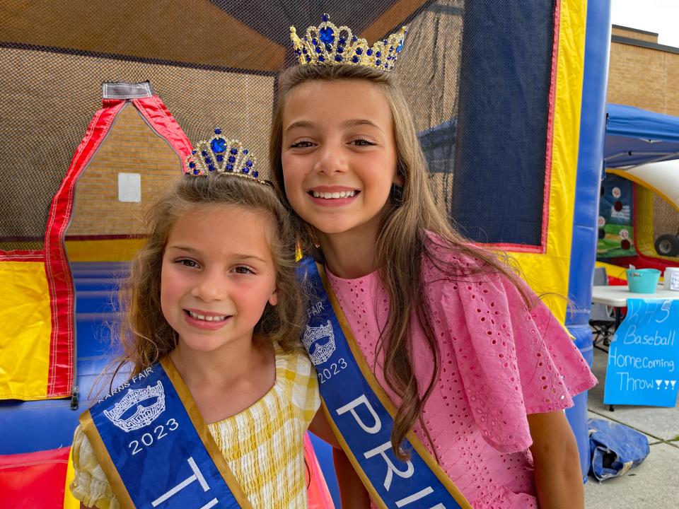Newly minted Fairest of the Fair princesses – Tiny Miss Brinkley Milligan and sister Princess Tybee Milligan – pop in to play in a bounce house at the 70th annual Karns Community Fair at Karns High School on July 15, 2023.