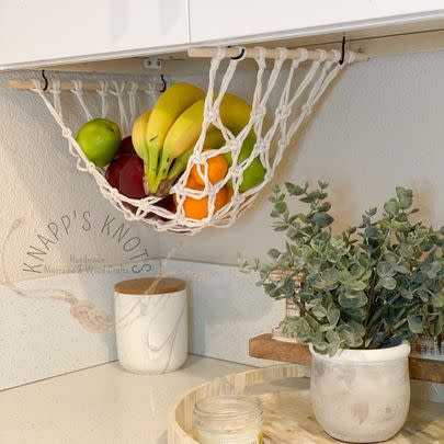 A macrame fruit hammock so all your produce has a cool place to hang out that's not a space-hogging bowl