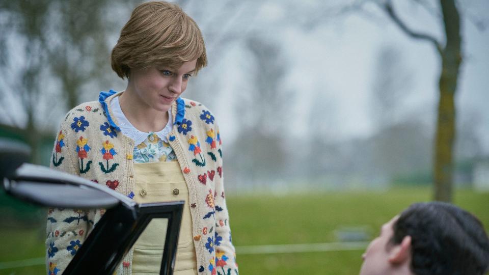 Emma Corrin as Princess Diana in yellow dungarees